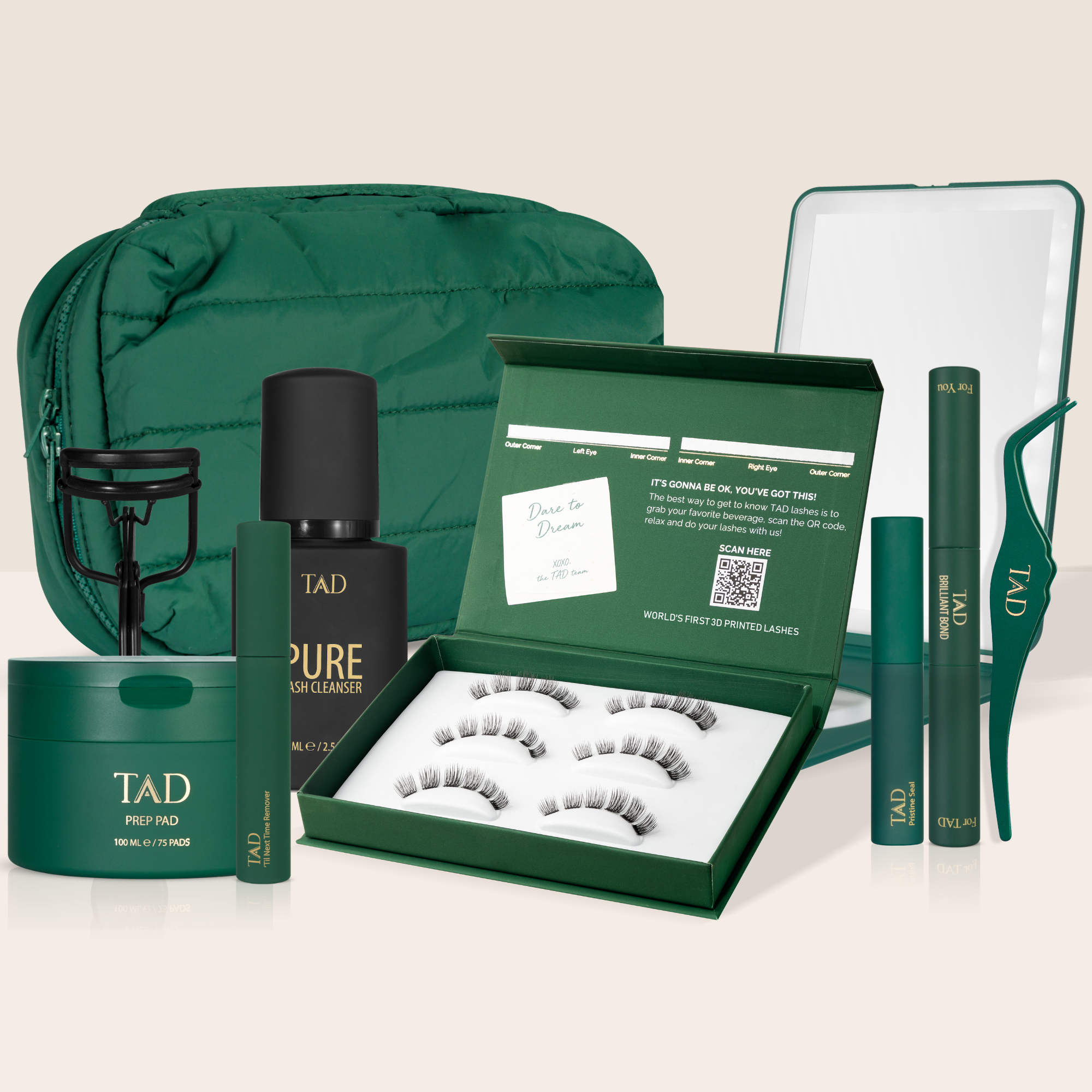 TAD skincare and beauty product set with green packaging on a white background